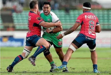  ?? GETTY IMAGES ?? Tasman prop Isaac Salmon, left, tackles Manawatu’s Michael Alaalatoa during this year’s Mitre 10 Cup campaign.