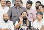  ?? PTI ?? Telangana Congress president N Uttam Kumar Reddy (centre) addresses the media. There are many claimants to the CM’s post in the Congress with Reddy and working president A Revanth Reddy leading the race