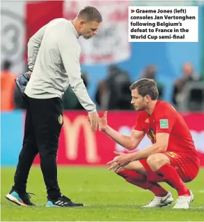  ??  ?? >
Graeme Jones (left) consoles Jan Vertonghen following Belgium’s defeat to France in the World Cup semi-final