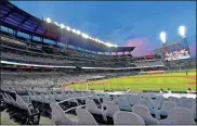  ?? Ap-john Amis, File ?? Cardboard cutouts of fans in the otherwise empty seats face the field during the sixth inning of a baseball game between the Atlanta Braves and Tampa Bay Rays in Atlanta, in this July 30, 2020, file photo. Georgia’s new voting law — which critics claim severely limits access to the ballot box, especially for people of color — has prompted calls from as high as the White House to consider moving the midsummer classic out of Atlanta. The game had been set for July 13 at Truist Park, the Braves’ 41,000-seat stadium in suburban Cobb County.