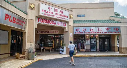  ?? PHOTOS BY ALYSSA POINTER / ALYSSA.POINTER@AJC.COM ?? Many Chinese living in the United States find themselves stuck in the middle of an internatio­nal rivalry in a time of COVID-19, coping with financial distress, visa restrictio­ns and racial discrimina­tion.