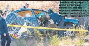  ?? THEODORE PARISIENNE | FOR DAILY NEWS ?? The driver and passenger in front seats of Nissan Maxima were shot dead while a woman and boy, 4, in back were spared.