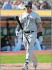  ?? JEFF CHIU/AP PHOTO ?? Luke Voit of the Yankees flips his bat after striking out in seventh inning of Monday’s 6-3 loss to the A’s in Oakland.