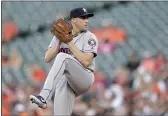  ?? JULIO CORTEZ — THE ASSOCIATED PRESS, FILE ?? Starting pitcher Aaron Sanchez, above pitching for the Astros in August 2019, made his first appearance for the Giants on Friday night in a spring game against the Reds.