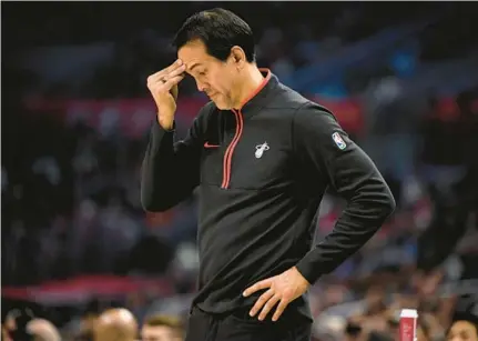  ?? ALEX GALLARDO/AP ?? Miami Heat coach Erik Spoelstra strategize­s during the second half against the Clippers on Monday in Los Angeles.