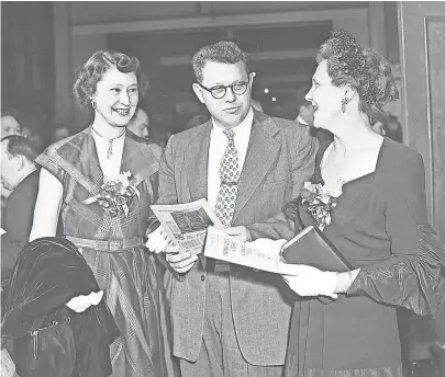  ?? THE COMMERCIAL APPEAL FILES ?? Many out-of-town visitors timed their April 1951 trips to Memphis to include the opera and among them was Mrs. Alfred F. Dantzler Jr. (Right) of Pascagoula, MS, who is the house guest of Mr. and Mrs. Walter P. Armstrong. She chats with the Armstrongs...