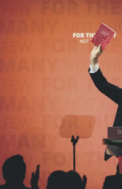  ??  ?? 0 Labour leader Jeremy Corbyn delivers a speech to supporters at an election rally at the Fruitmarke­t in Glasgow last night. He has committed to build thousands of houses and promised to tackle poverty and inequality