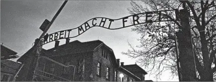  ??  ?? The main entrance to Auschwitz I with the Nazi slogan Arbeit Macht Frei — a German phrase meaning “work will set you free.”