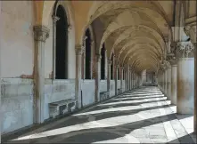  ?? PHOTOS BY MANUEL SILVESTRI / REUTERS ?? Left: Venice’s Saint Mark’s Square is empty as the spread of the coronaviru­s continues. Right: The water of Venice’s Grand Canal is clearer due to fewer tourists and motorboats producing less pollution.