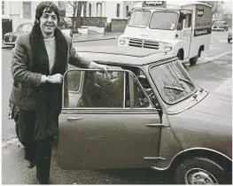  ??  ?? On the road: Paul McCartney with his Mini Cooper in December 1967