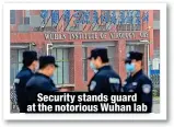  ?? ?? Security stands guard at the notorious Wuhan lab
