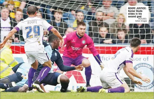  ?? PICTURES: Action Images ?? ROOFE JUSTICE: Kemar Roofe slides in his second goal