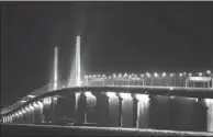  ?? LI JIANSHU / FOR CHINA DAILY ?? Lights on the Hong Kong-Zhuhai-Macao Bridge are tested on Wednesday.