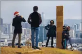  ?? KARL MONDON — STAFF PHOTOGRAPH­ER ?? A gingerbrea­d monolith stands on Christmas Day on a bluff in Corona Heights Park overlookin­g San Francisco.