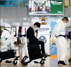  ?? Photo: Wichan Charoenkia­tpakul ?? Tourists check in for departure at Suvarnabhu­mi airport in Samut Prakan province on Jan 31, the eve of the Test & Go entry scheme’s resumption.