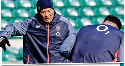  ??  ?? Making his point: England head coach Eddie Jones gives pointers in training at Twickenham yesterday