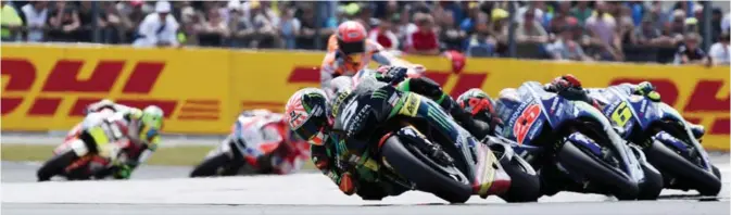  ?? AFP ?? LE MANS: France’s rider Johann Zarco on his Monster Yamaha TECH 3 MOTOGP N∞5 competes ahead Spanish’s rider Maverick Vinales on his Movistar Yamaha MOTOGP N∞25 and Italy’s rider Valentino Rossi on his Movistar Yamaha MOTOGP N∞46 during the French...
