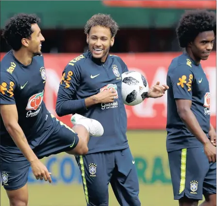  ?? PICTURE: REUTERS ?? THREE AMIGOS: Brazil’s Marquinhos, Neymar and Willian during training at the Ernst Happel Stadium in Vienna, Austria.