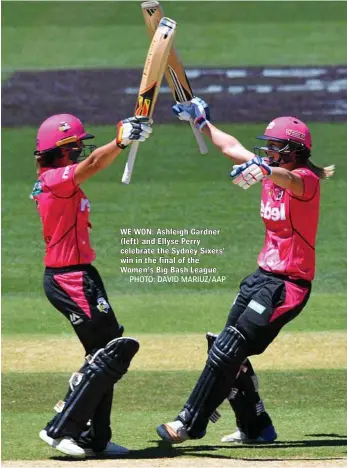  ?? PHOTO: DAVID MARIUZ/AAP ?? WE WON: Ashleigh Gardner (left) and Ellyse Perry celebrate the Sydney Sixers’ win in the final of the Women's Big Bash League.