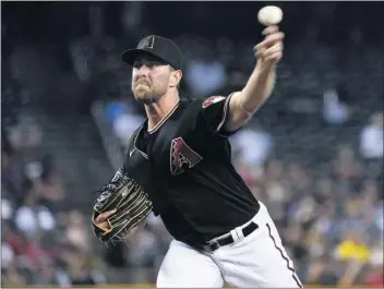  ?? MATT YORK — THE ASSOCIATED PRESS ?? Former USC standout Tyler Gilbert of the Diamondbac­ks threw a no-hitter on Saturday against San Diego in his first MLB start.