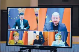  ??  ?? Leaders of China, Germany, France and others are seen Wednesday during a videoconfe­rence to approve an investment pact between China and the EU.
JOHANNA GERON/REUTERS