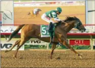  ?? (Benoit Photo via AP) ?? In a photo provided by Benoit Photo, Accelerate and jockey Joel Rosario win the Grade I, $1,000,000 TVG Pacific Classic horse race Saturday, Aug. 18, 2018, at Del Mar Thoroughbr­ed Club in Del Mar, Calif.