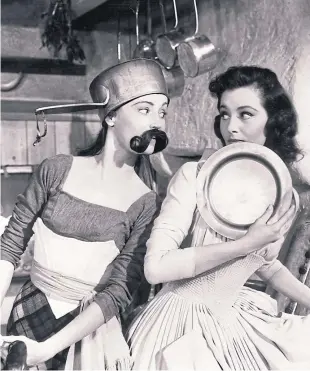  ?? Picture: Shuttersto­ck. ?? Virginia Bosler, left, and Cyd Charisse in the 1954 movie Brigadoon. The film also starred Gene Kelly and Van Johnson.