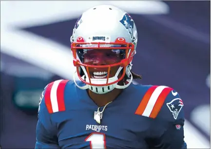  ?? MADDIE MEYER — GETTY IMAGES ?? First-year Patriots quarterbac­k Cam Newton again is the run-pass dual-threat player he was in his best seasons with the Carolina Panthers.