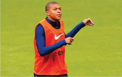  ??  ?? France’s new rising star - young striker Mbappe - who scored his first goal for his country in the match against the Netherland­s on the day he joine Neymar at Paris St Germain
Photo: AP