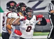  ?? Nic Antaya Getty I mages ?? BALL STATE’S Christian Albright celebrates after recovering a fumble for a touchdown against Buffalo.