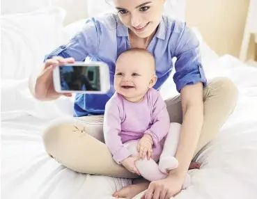  ?? PHOTO: GETTY IMAGES ?? ‘‘Say cheese so I can show all my friends how cute you are — and unwittingl­y show corporatio­ns your age, race and gender!’’