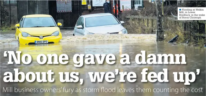  ??  ?? ●●Flooding at Welkin Mill, in Lower Bredbury, in the wake of Storm Christoph