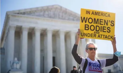  ?? Photograph: Mandel Ngan/AFP/Getty Images ?? Pro-choice protesters outside the supreme court in Washington on Monday.