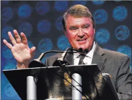  ?? Chuck Burton ?? The Associated Press ACC Commission­er John Swofford said Wednesday he’s “not pleased” about the black eye Louisville has given his conference.