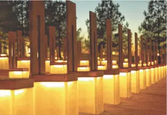  ?? HEATHER WINES, GANNETT ?? Empty chairs symbolize the dead at the Oklahoma City National Memorial.