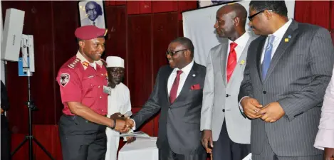  ??  ?? FRSC Corps Marshal Osita Chidoka with Health Minister Onyebuchi Chukwu at the launching of a new 5-year curriculum for parademic technology in Abuja recently.