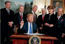  ?? PHOTO: AP ?? US President Donald Trump speaks before signing a memorandum imposing tariffs and investment restrictio­ns on China, at the White House.