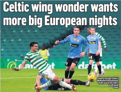  ?? PA WIRE ?? Cherry on top: Celtic’s Mohamed Elyounouss­i (left) scores his side’s
sixth goal