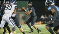  ?? KENDALL WARNER/STAFF ?? Warhill quarterbac­k Liam Francisque looks to pass in a victory against Lafayette this season. Both of those teams are seeking region titles today.