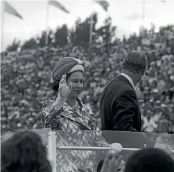  ?? ?? 1974: The Queen and Prince Phillip wave to the crowds at the fondly remembered Commonweal­th Games in Christchur­ch.