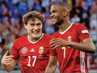  ?? ?? CALL OF DUTY Callum Styles (left) celebrates with Loic Nego as Hungary beat England in Budapest last weekend