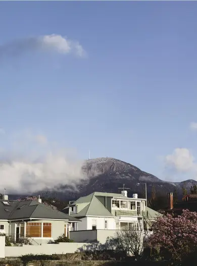  ??  ?? (Below, from left) View of Mount Wellington from Sandy Bay; Carl Windsor (left) and James Kingston of Willing Bros Wine Merchants