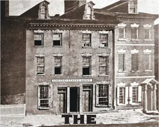  ?? ?? The Seventh Street facade of the Philadelph­ia Mint as it appeared in the 1820s. The view is adapted from a photograph of the 1850s.