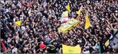  ?? AFP ?? Supporters of the Hezbollah resistance movement carry the coffin of one of their members who was killed during an attack in Beirut, Lebanon, on October 15, 2021.
