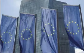  ?? ?? The European Central Bank raised its key interest rate by a half-percentage
point to zero last week. PHOTO : WOLFGANG RATTAY/REUTERS