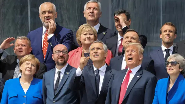  ?? Reuters ?? (First row L-R) German Chancellor Angela Merkel, Belgium’s Prime Minister Charles Michel, Nato Secretary-General Jens Stoltenber­g, US President Donald Trump, Britain’s Prime Minister Theresa May (second row L-R) Denmark’s Prime Minister Lars Lokke Rasmussen, Norway’s Prime Minister Erna Solberg, Poland’s President Andrzej Duda, French President Emmanuel Macron (third row) Albania’s Prime Minister Edi Rama, Czech Republic President Milos Zeman and Spain’s Prime Minister Pedro Sanchez at the Nato headquarte­rs in Brussels on Wednesday. —