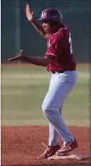  ?? Erik Verduzco Las Vegas Review-journal ?? Pitcher-infielder Aaron Roberts, heading to California on a baseball scholarshi­p, leads Desert Oasis in the Desert Region tournament.