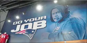  ?? STEVEN SENNE/AP PHOTO ?? A mural with a likeness of Patriots head coach Bill Belichick is featured on a wall Thursday at the Patriots ProShop in Foxborough, Mass.