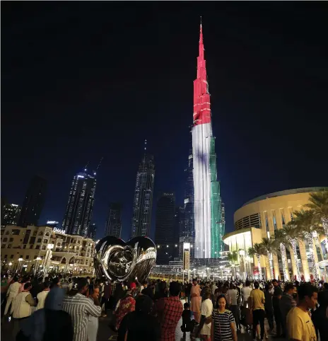  ?? Pawan Singh / The National ?? Burj Khalifa during National Day celebratio­ns. The UAE raised its overnight deposit rate by half a percentage point