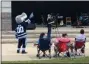  ?? ADAM DODD — THE NEWS-HERALD ?? Slam, the mascot for the Mentor Ice Breakers was on hand to dance along with the performanc­es on stage at Deepwood Rocks.